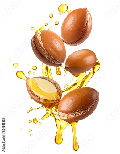 Argun Nuts and Oil with Green Leaves - Transparent Background - Cracked open nuts Falling - Food Image for Health and Beauty - Raw Food and Cosmetic Ingredient - Hair Shampoo and Vitamin Benefits