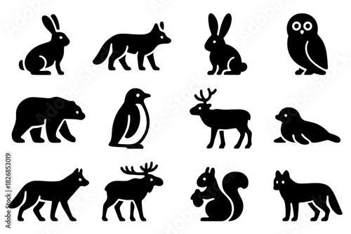 Snow Wildlife Icons. Snow-adapted wildlife. Solid icon set of Snow-adapted wildlife: snow hare, fox, rabbit, owl, polar bear, penguin, reindeer, seal, wolf,