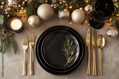 Elegant Holiday Dinner Table Setup With Gold Utensils and Festive Decorations