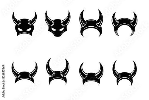 Collection of Eight Black Horned Helmets and Masks.
