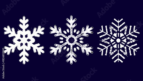Three white snowflakes with a distressed texture on a dark blue background