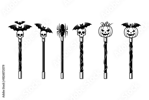 Halloween Themed Staffs with Skulls Spiders and Pumpkins.