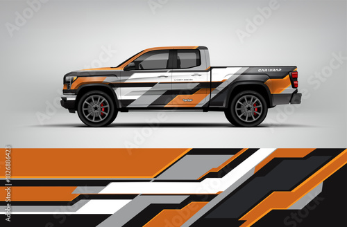White and orange pickup wrap featuring layered geometric panels with technical racing-inspired shapes. Editable vector EPS included.