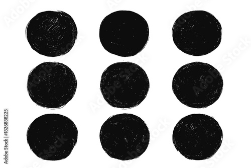 Abstract seamless pattern of textured black circles with rough charcoal brush strokes