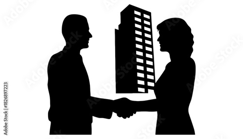 Silhouettes of business people shaking hands in front of a building