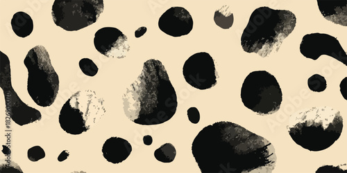Padrão abstrato de manchas pretas e irregulares sobre fundo bege, textura de arte moderna.