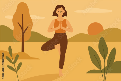 Woman practicing yoga in tranquil fall landscape with sunset and trees