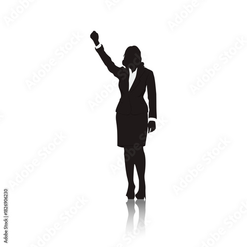Empowered Silhouette: A businesswoman's silhouette raises her fist in a gesture of triumph and determination. a symbol of strength and professional assertiveness.
