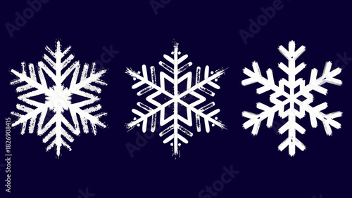 Three white snowflakes with brushstroke texture on dark blue background