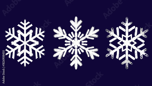 Three white snowflakes on a dark blue background