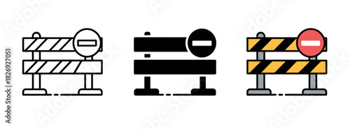 Construction barriers with a prohibition sign indicate a restricted area or road closure.