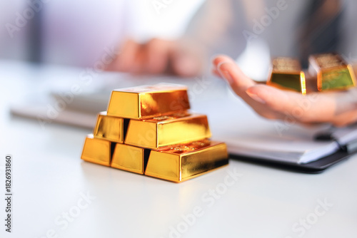 Gold Trading Businessman invest in trading gold, calculating profit price of buy and sell gold.