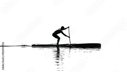 Stand Up Paddleboarder Silhouette Paddling on Calm Water