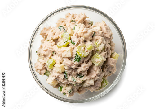 Freshly prepared tuna salad in a clear glass bowl overhead view