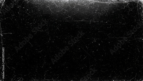Dark background with abundant white scratches and dust