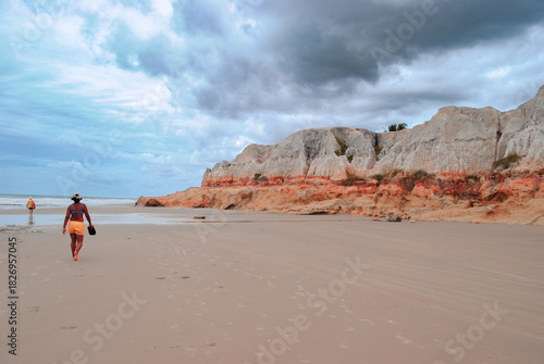 young woman running on the beach