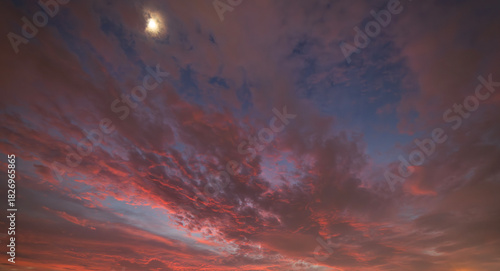 Beautiful bright sunset sky with colorful clouds. Sky background.