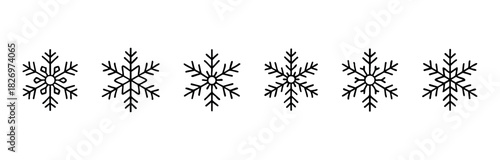 Collection of simplified black line art snowflakes suitable for winter holiday decorations and seasonal graphic projects.