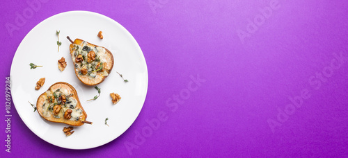 Baked pear with blue cheese, honey, and nuts. Healthy eating. Vegetarian food.