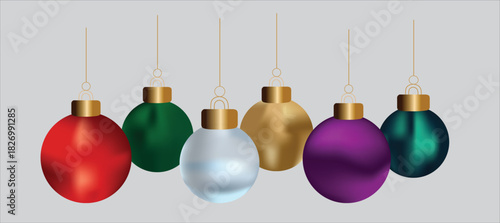 Colorful christmas balls hanging on strings for holiday decoration