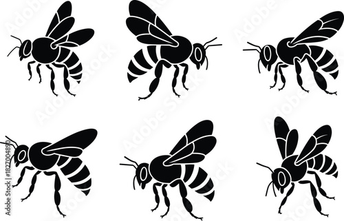 Collection of flying honey bee silhouettes, black vector insect icons, bumblebee graphic set, isolated design elements on white background.