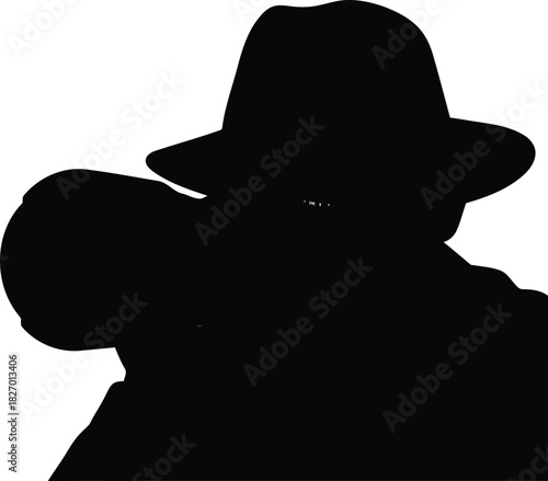 Silhouette of photographer with vintage camera, noir style