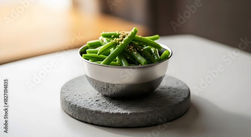 Wholesome steamed green beans topped with sesame seeds for effortless plant-based side dish and minimalist wellness inspiration