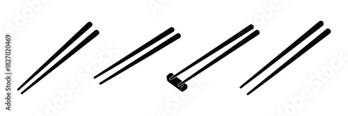 Four pairs of chopsticks isolated on white background in a row