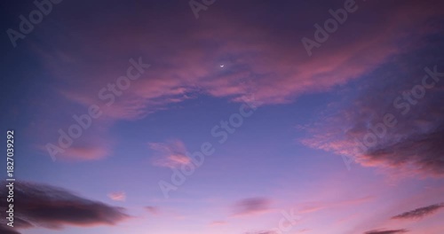Wallpaper Mural Timelapse of colorful dusk sky with waxing crescent moon visible Torontodigital.ca