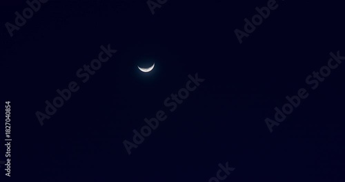 Wallpaper Mural Timelapse of waxing crescent moon movement from twilight to night time Torontodigital.ca