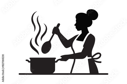 Silhouette of a woman cooking and stirring food in a pot