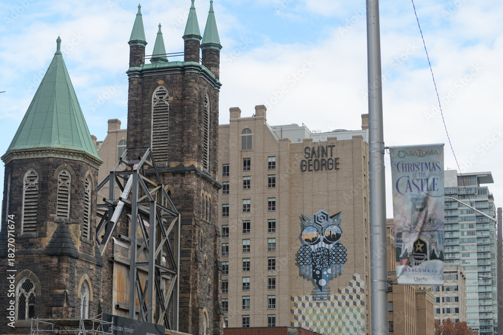 Fototapeta premium Cielo Residences, condo development by Collecdev-Markee, incorporating former Bloor St United Church, 300 Bloor St W, Toronto (Kimpton Saint George hotel, mural by Jerry Rugg)