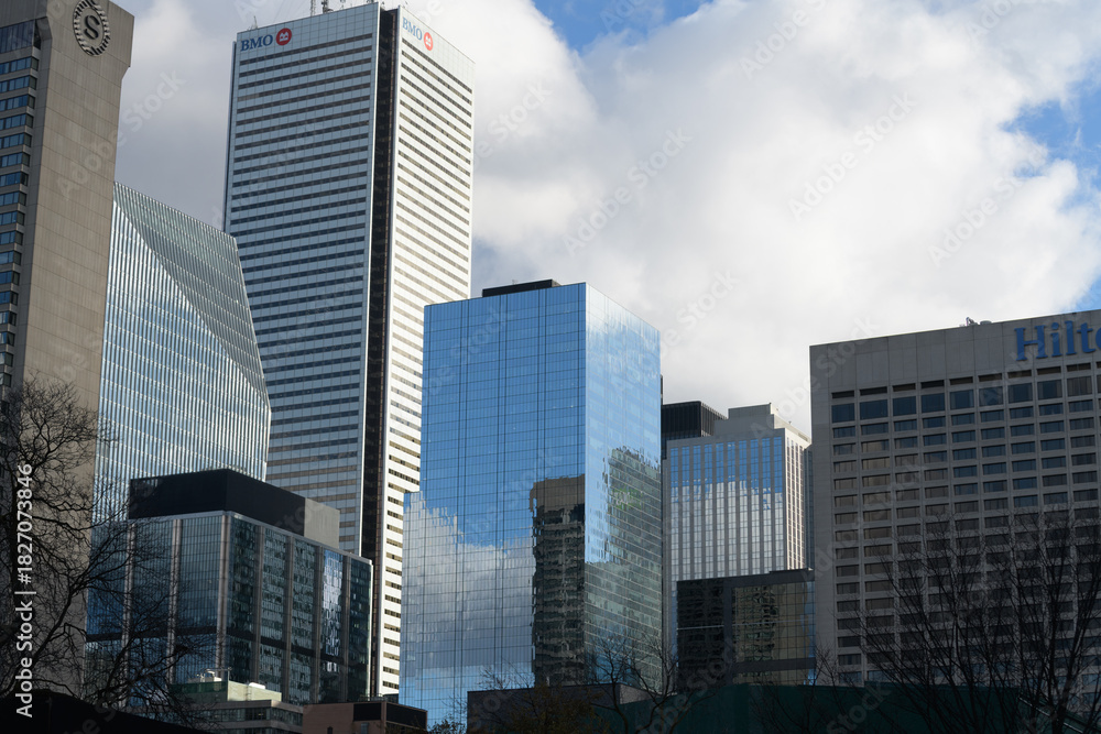 Fototapeta premium Sheraton Centre Toronto Hotel and Hilton Toronto, including First Canadian Place, BMO, Bank of Montreal - looking southeast on University Av