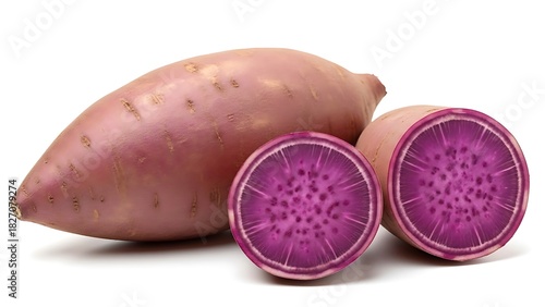 Purple sweet potato with cut half showing vibrant violet flesh and texture isolated on white background