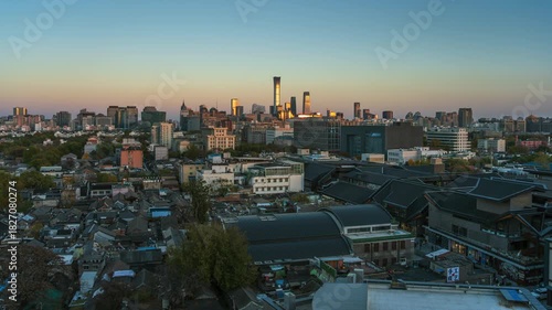 Time-lapse of Beijing, China, transitioning from day to night, showcasing the blend of old and new in the urban landscape