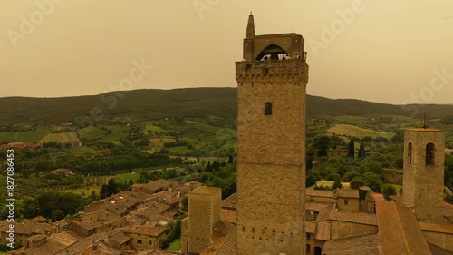 Flying past the towers of the ancient Italian town of San Gimignano