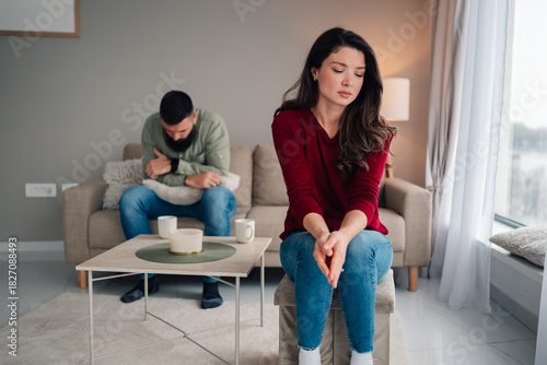 Couple having conflict after argument, feeling upset and distant