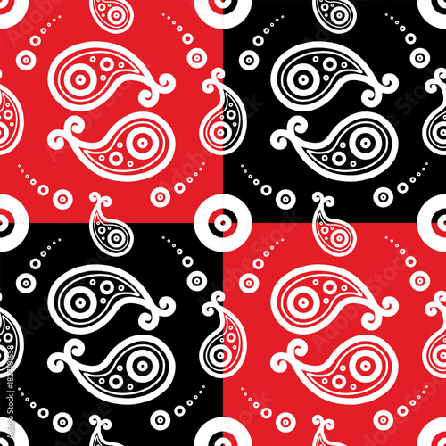 Seamless paisley pattern in alternating red and black squares, with white teardrop swirls and dotted circles creating a tileable, high-contrast ornamental design.