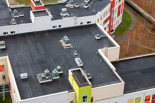 Flat rooftop with ventilation units aerial view