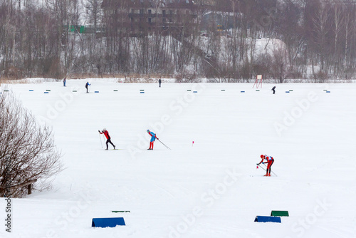 People activity cross country skiing in snowy cold winter forest trail