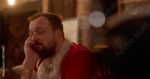 Stressed santa claus having a bad conversation at a bar