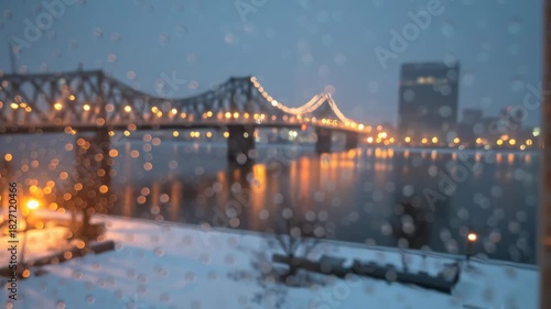 A window with a view of a bridge and a river