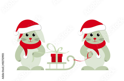 bunnies with caps and scarfs and sledge with gift isolated on white background