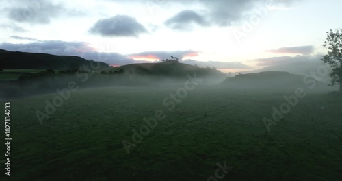 Flying over foggy fields in Yorkshire Dales