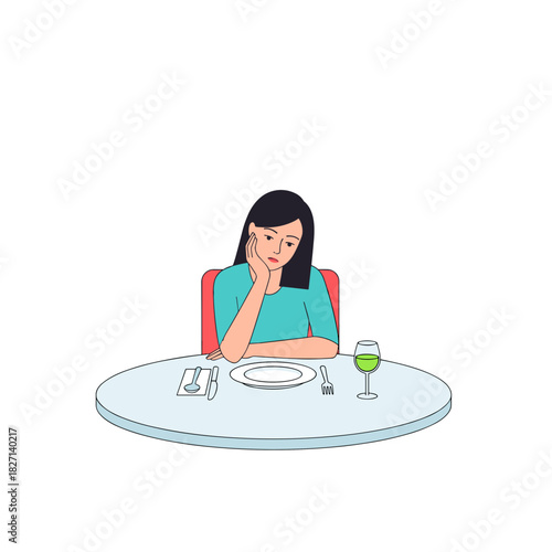 Lonely woman sitting at dinner table looking thoughtful  