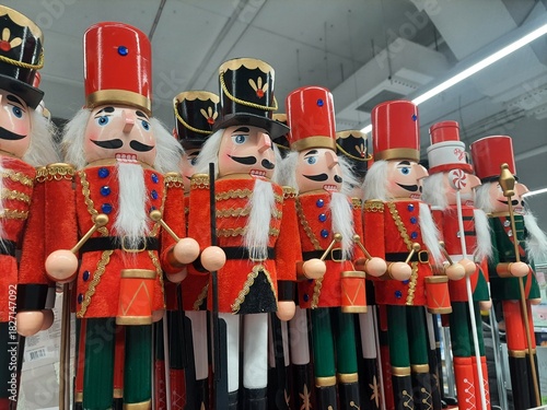 wooden nutcracker toys stand on a shelf