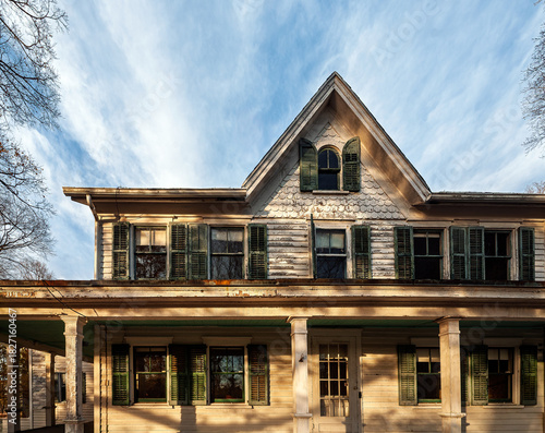 Weathered Ambler Farm house facade in Wilton Connecticut