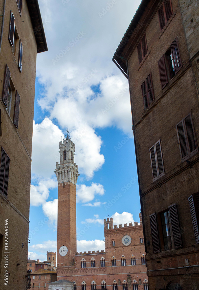 Fototapeta premium Medieval Tower Framed by Historic Buildings