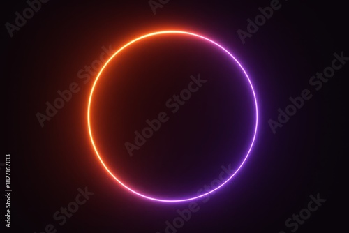 Glowing circle in a dark background. The circle is made up of different colors, including red, orange, and purple. The colors are bright and vibrant, creating a sense of energy and excitement