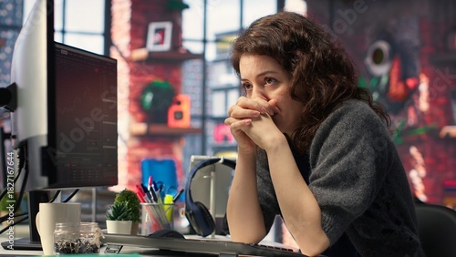 Devastated sad woman losing financial value on stock trading platform, crying and being stressed following market crash. Worried overwhelmed investor deals with monetary losses. Camera B.